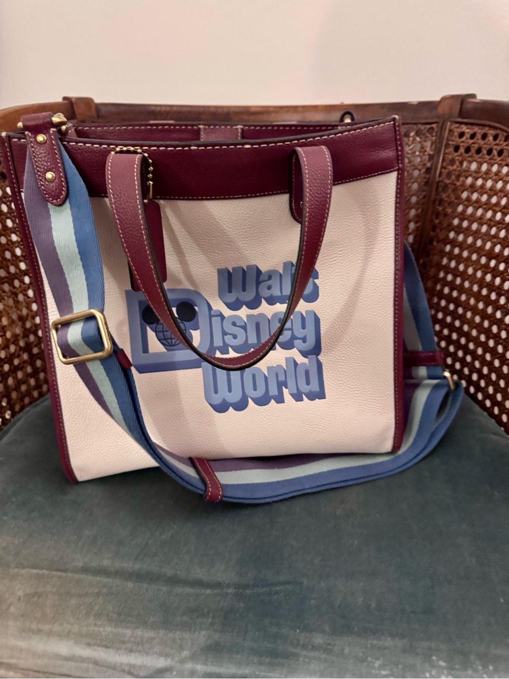 Coach Walt Disney World tote in Cream and Burgundy with Blue Striped Strap